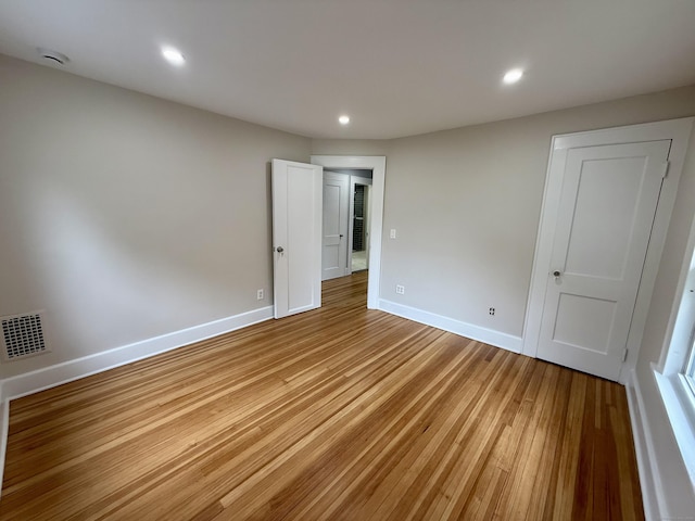 654 Nichols Ave, Stratford, CT 06614 - unfurnished bedroom with light wood finished floors and recessed lighting