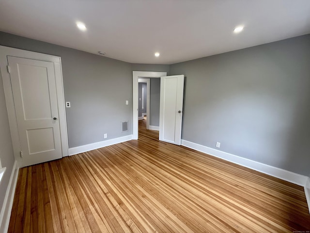 654 Nichols Ave, Stratford, CT 06614 - empty room featuring light wood-style flooring and recessed lighting