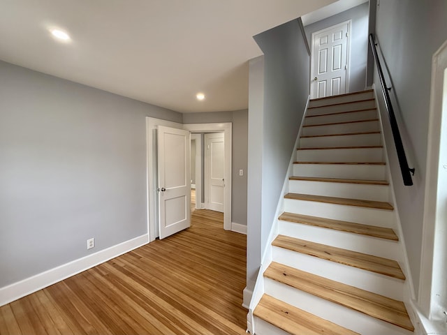 654 Nichols Ave, Stratford, CT 06614 - stairs featuring wood finished floors and recessed lighting