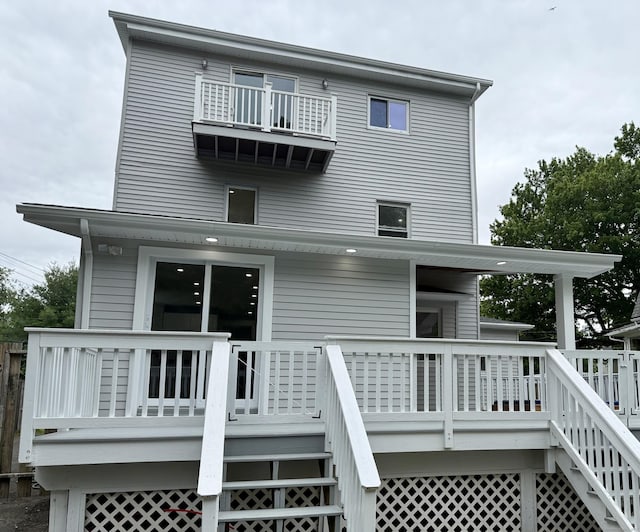 654 Nichols Ave, Stratford, CT 06614 - rear view of house featuring stairway and a deck
