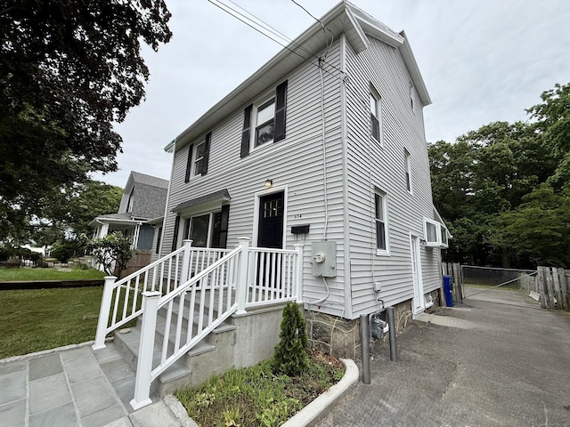 654 Nichols Ave, Stratford, CT 06614 - view of front facade featuring a gate