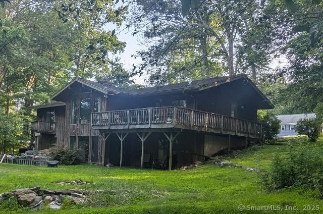 35 Sturbridge Rd, Easton, CT 06612 - rear view of house with a yard and a deck