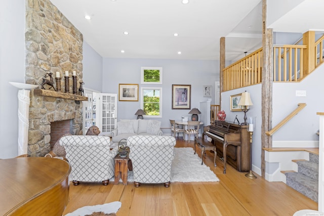 168 Cobble Rd, Kent, CT 06757 - living area featuring stairway, light wood-type flooring, recessed lighting, and a fireplace