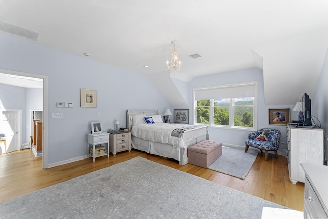 168 Cobble Rd, Kent, CT 06757 - bedroom featuring light wood-type flooring, a chandelier, and vaulted ceiling