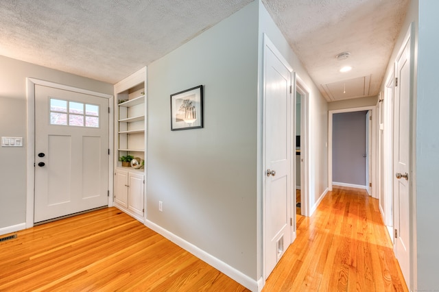226 Farm Hill Rd, Middletown, CT 06457 - foyer featuring a textured ceiling and light wood-style flooring