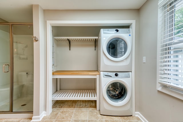 226 Farm Hill Rd, Middletown, CT 06457 - washroom with stacked washer / drying machine and tile patterned floors