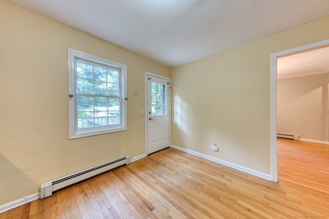 20 Copper Hill Dr Unit 20, Guilford, CT 06437 - entryway featuring baseboard heating and light wood finished floors