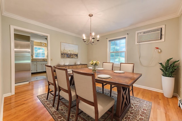 20 Copper Hill Dr Unit 20, Guilford, CT 06437 - dining area with a wall mounted AC, a chandelier, crown molding, and light wood finished floors