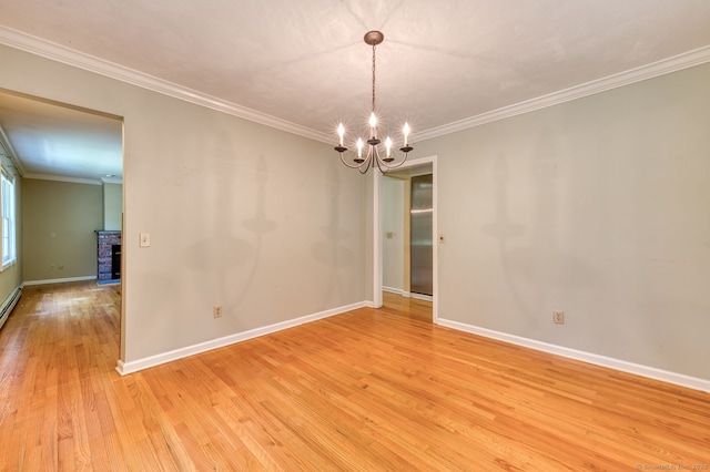 20 Copper Hill Dr Unit 20, Guilford, CT 06437 - unfurnished room featuring a chandelier, light wood-style floors, ornamental molding, and a fireplace