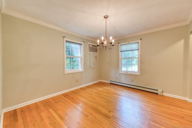 20 Copper Hill Dr Unit 20, Guilford, CT 06437 - spare room featuring a baseboard radiator, a chandelier, light wood-type flooring, a wall unit AC, and ornamental molding
