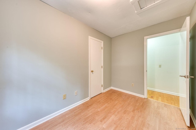 20 Copper Hill Dr Unit 20, Guilford, CT 06437 - unfurnished bedroom featuring wood finished floors and baseboards