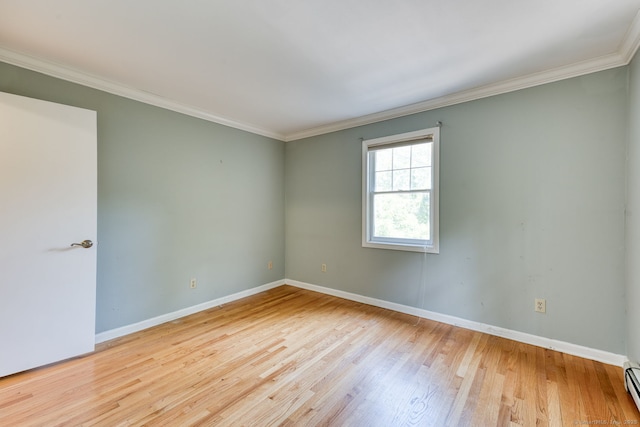 20 Copper Hill Dr Unit 20, Guilford, CT 06437 - empty room featuring wood finished floors, ornamental molding, and a baseboard heating unit