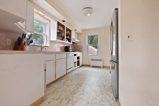 30 Cedar Crest Pl, Norwalk, CT 06854 - kitchen featuring radiator, freestanding refrigerator, dishwasher, white cabinets, and light countertops