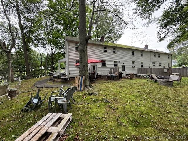 131 N Ridgeland Rd, Wallingford, CT 06492 - back of house featuring an outdoor fire pit