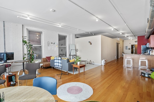 817 Grand Ave Unit 202, New Haven, CT 06511 - living area featuring wood finished floors and rail lighting