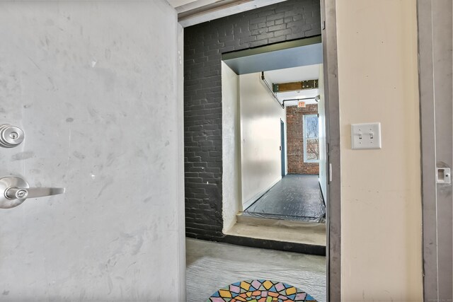 817 Grand Ave Unit 202, New Haven, CT 06511 - hallway featuring brick wall