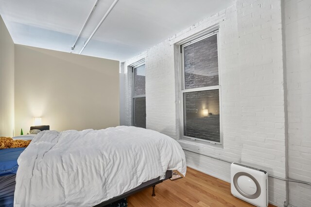 817 Grand Ave Unit 202, New Haven, CT 06511 - bedroom featuring wood finished floors and heating unit