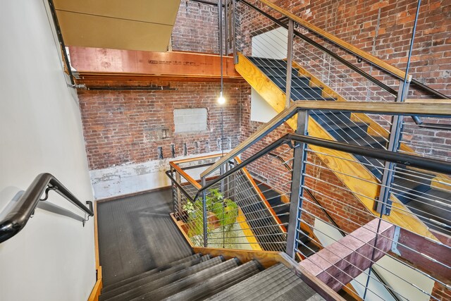 817 Grand Ave Unit 202, New Haven, CT 06511 - stairs with brick wall