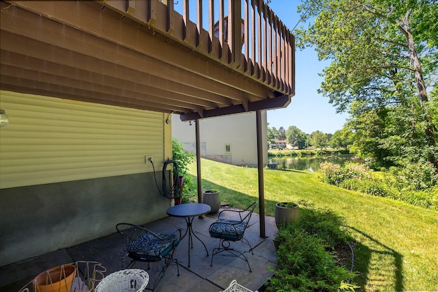 view of patio / terrace featuring a water view