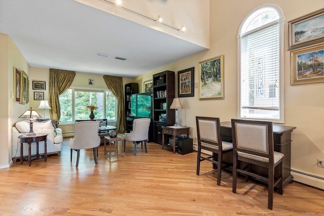 living area featuring light wood-style flooring