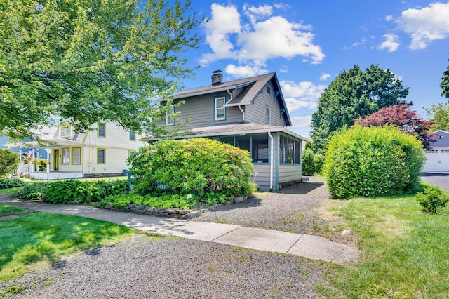 159 Jefferson St, Stratford, CT 06615 - view of front of house featuring a sunroom and a chimney