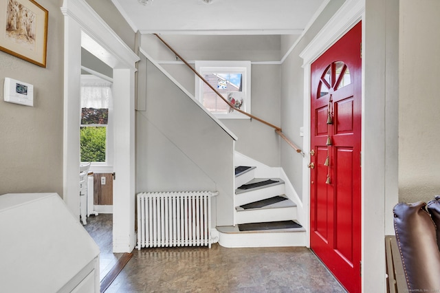 159 Jefferson St, Stratford, CT 06615 - entrance foyer featuring radiator, healthy amount of natural light, and stairway