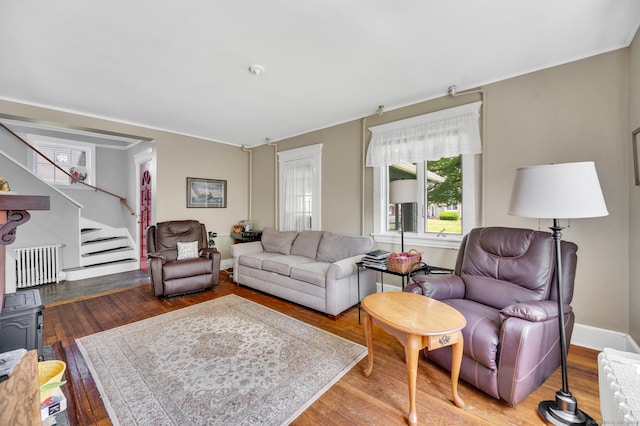 159 Jefferson St, Stratford, CT 06615 - living area featuring wood finished floors, radiator, and stairs