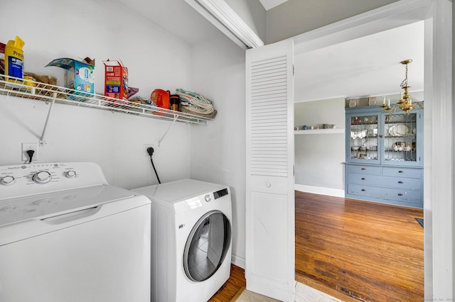 159 Jefferson St, Stratford, CT 06615 - laundry room featuring separate washer and dryer and wood finished floors