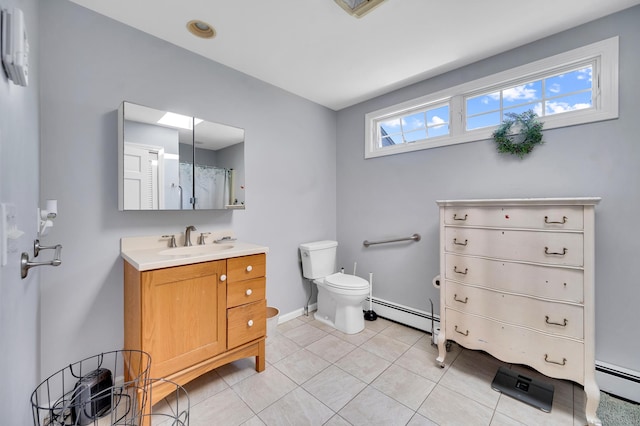 159 Jefferson St, Stratford, CT 06615 - bathroom with a baseboard heating unit, vanity, tile patterned flooring, and a shower with shower curtain