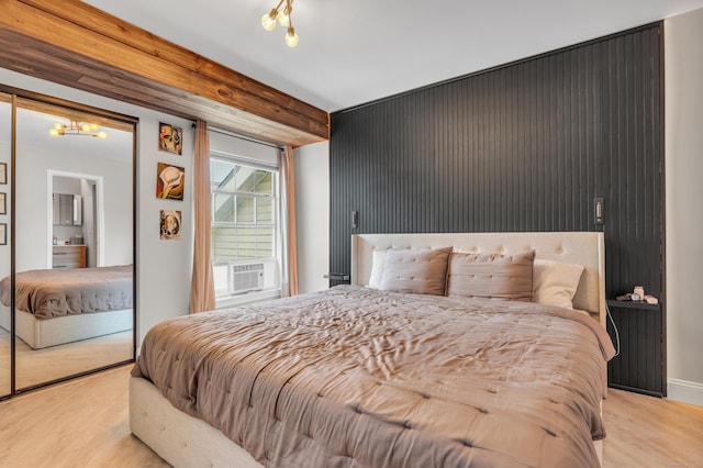323 Carriage Crossing Ln Unit 323, Middletown, CT 06457 - bedroom with wood finished floors, a chandelier, and cooling unit