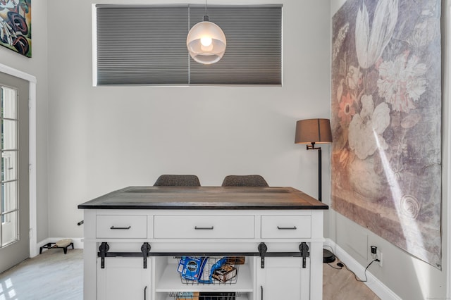 323 Carriage Crossing Ln Unit 323, Middletown, CT 06457 - detailed view of wood finished floors and baseboards