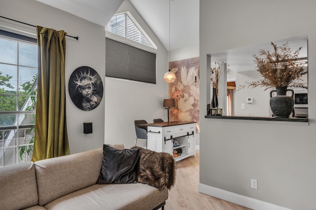 323 Carriage Crossing Ln Unit 323, Middletown, CT 06457 - living room featuring plenty of natural light, light wood-type flooring, and high vaulted ceiling