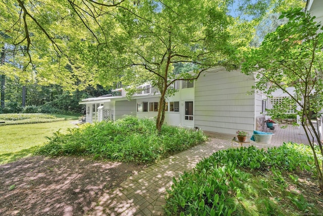 12 Twin Ponds Dr, Farmington, CT 06085 - view of home's exterior featuring a yard