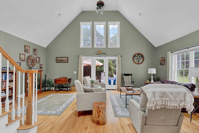 6 Augusta Cir Unit 6, East Haddam, CT 06469 - living area featuring high vaulted ceiling, wood finished floors, and healthy amount of natural light