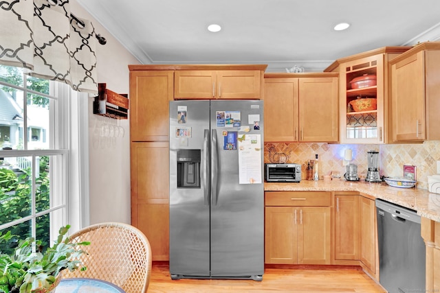 6 Augusta Cir Unit 6, East Haddam, CT 06469 - kitchen with stainless steel appliances, healthy amount of natural light, decorative backsplash, light stone countertops, and crown molding