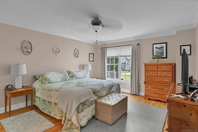 6 Augusta Cir Unit 6, East Haddam, CT 06469 - bedroom with ornamental molding, light wood-style floors, and a ceiling fan