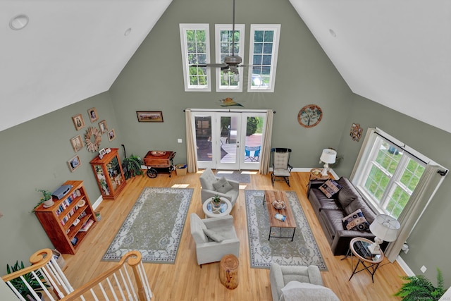 6 Augusta Cir Unit 6, East Haddam, CT 06469 - living room with high vaulted ceiling, french doors, and wood finished floors