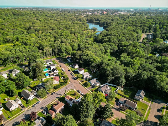 302 E Pasadena Pl, Bridgeport, CT 06610 - aerial overview of property's location with a heavily wooded area and a large body of water