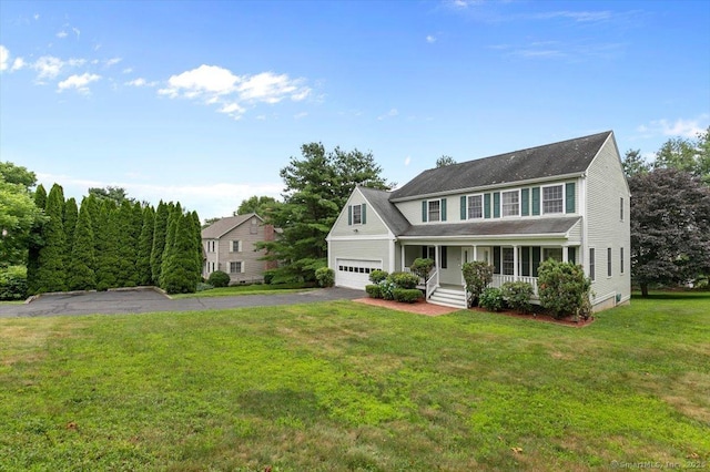 92 Tyler City Rd, Orange, CT 06477 - colonial house with covered porch, asphalt driveway, and a front yard