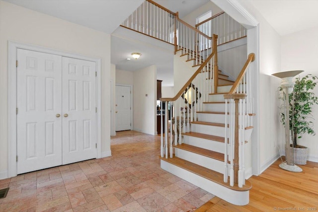 92 Tyler City Rd, Orange, CT 06477 - stairs featuring baseboards and a high ceiling