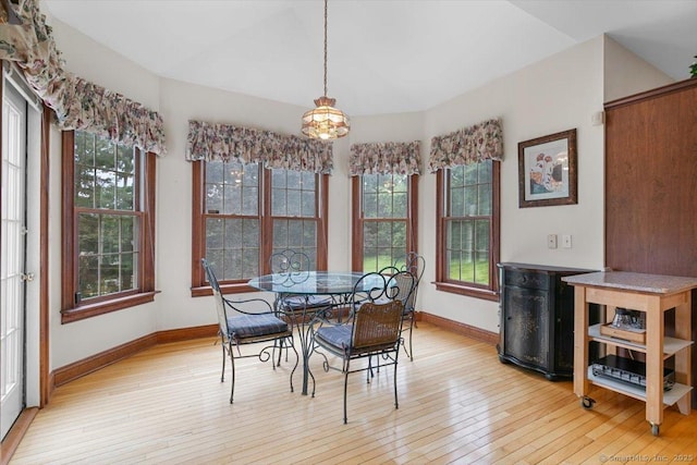 92 Tyler City Rd, Orange, CT 06477 - dining space featuring light wood-type flooring and a chandelier