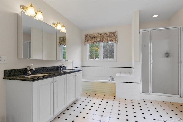 92 Tyler City Rd, Orange, CT 06477 - bathroom featuring a shower stall, double vanity, a garden tub, and tile patterned floors