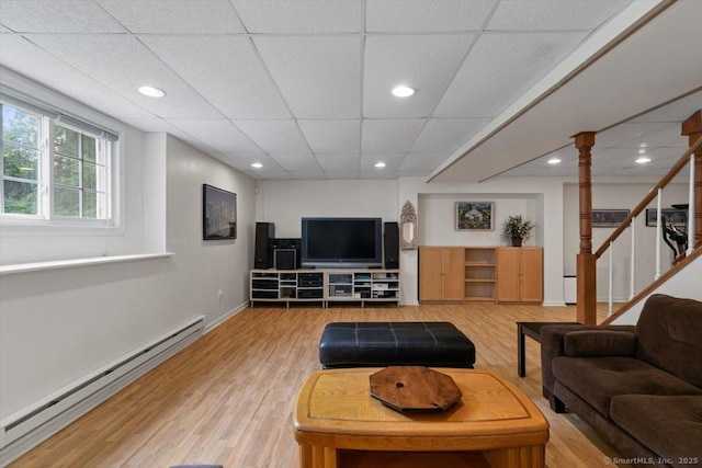92 Tyler City Rd, Orange, CT 06477 - living area with a baseboard radiator, light wood-type flooring, stairway, a paneled ceiling, and recessed lighting