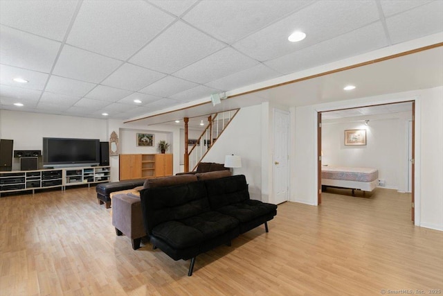 92 Tyler City Rd, Orange, CT 06477 - living room featuring light wood finished floors, stairs, a paneled ceiling, and recessed lighting