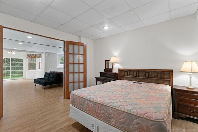 92 Tyler City Rd, Orange, CT 06477 - bedroom featuring wood finished floors, a paneled ceiling, and recessed lighting