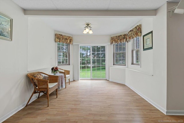 92 Tyler City Rd, Orange, CT 06477 - sitting room with wood finished floors and baseboards