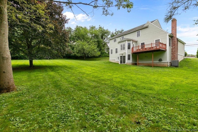 92 Tyler City Rd, Orange, CT 06477 - view of grassy yard featuring a deck