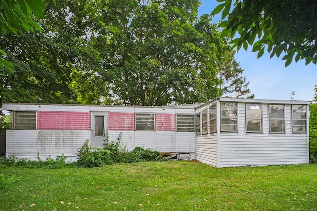 46 Harrington Dr, Plainfield, CT 06374 - view of front facade featuring a front lawn