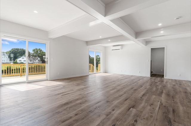 281 E Ave, Norwalk, CT 06850 - unfurnished living room with beamed ceiling, a wall mounted air conditioner, wood finished floors, and recessed lighting