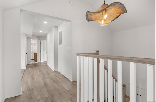 281 E Ave, Norwalk, CT 06850 - corridor featuring light wood finished floors, recessed lighting, vaulted ceiling, and an upstairs landing